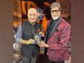 Anupam Kher meets Amitabh Bachchan to present his book on KBC set - Hindi News | Anupam Kher meets Amitabh Bachchan to present his book on KBC set | Latest entertainment News at Lokmattimes.com