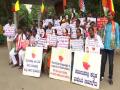 K'taka: Cong supporters protest against Amit Shah's call to make Hindi national language - Hindi News | K'taka: Cong supporters protest against Amit Shah's call to make Hindi national language | Latest national News at Lokmattimes.com