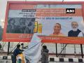 UP implements ECI's Model Code of Conduct; removes hoardings of political parties ahead of polls - Hindi News | UP implements ECI's Model Code of Conduct; removes hoardings of political parties ahead of polls | Latest national News at Lokmattimes.com