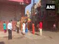 Devotees maintain social distancing at temple in K'taka's Hubli - Hindi News | Devotees maintain social distancing at temple in K'taka's Hubli | Latest national News at Lokmattimes.com
