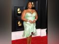 Lizzo rocks a seafoam green dress at 2021 Grammys - Hindi News | Lizzo rocks a seafoam green dress at 2021 Grammys | Latest lifestyle News at Lokmattimes.com