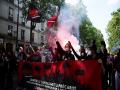 Police fire tear gas to disperse crowds at May Day demonstrations in Paris - Hindi News | Police fire tear gas to disperse crowds at May Day demonstrations in Paris | Latest international News at Lokmattimes.com