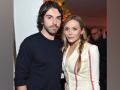 Elizabeth Olsen married now? Actor casually calls longtime beau Robbie Arnett her 'husband' - Hindi News | Elizabeth Olsen married now? Actor casually calls longtime beau Robbie Arnett her 'husband' | Latest entertainment News at Lokmattimes.com