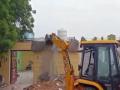 MP administration demolishes houses of accused who tied up, dragged tribal man to death - Hindi News | MP administration demolishes houses of accused who tied up, dragged tribal man to death | Latest national News at Lokmattimes.com