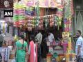 COVID-19 scare dampens Holi spirit as sales of colours and other items affected in UP - Hindi News | COVID-19 scare dampens Holi spirit as sales of colours and other items affected in UP | Latest national News at Lokmattimes.com
