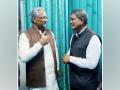 BJP leader Trivendra Singh Rawat meets Cong's Harish Rawat in Dehradun - Hindi News | BJP leader Trivendra Singh Rawat meets Cong's Harish Rawat in Dehradun | Latest politics News at Lokmattimes.com