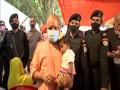 Adityanath meets flood victims, distributes relief material in UP's Siddharthnagar - Hindi News | Adityanath meets flood victims, distributes relief material in UP's Siddharthnagar | Latest national News at Lokmattimes.com