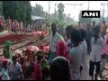 Protesters block railway tracks in Hooghly, demand train services - Hindi News | Protesters block railway tracks in Hooghly, demand train services | Latest national News at Lokmattimes.com