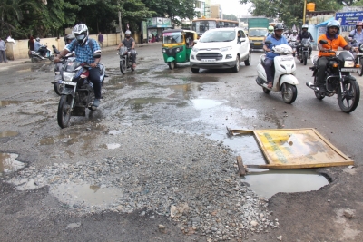 Bengaluru pothole menace: K'taka High Court slams civic body, asks NHAI for quality check | Bengaluru pothole menace: K'taka High Court slams civic body, asks NHAI for quality check Bengaluru pothole menace: K'taka High Court slams civic body, asks NHAI for quality check | Bengaluru pothole menace: K'taka High Court slams civic body, asks NHAI for quality check