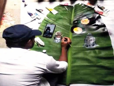 In an unusual art form, UP student paints on banana leaves | In an unusual art form, UP student paints on banana leaves