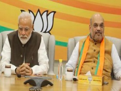 Amid buzz of cabinet reshuffle, PM Modi holds meeting with Amit Shah | Amid buzz of cabinet reshuffle, PM Modi holds meeting with Amit Shah