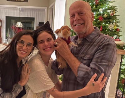 Bruce Willis's holiday season pics show him cuddling with a pup | Bruce Willis's holiday season pics show him cuddling with a pup