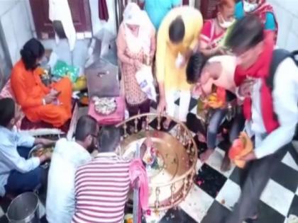 Devotees offer prayers at Haridwar's Daksha Mahadev Temple on last Monday of Sawan | Devotees offer prayers at Haridwar's Daksha Mahadev Temple on last Monday of Sawan