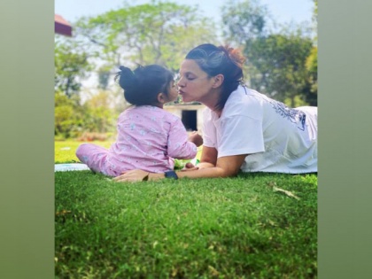 Neha Dhupia's daughter accompanies her for a shoot | Neha Dhupia's daughter accompanies her for a shoot