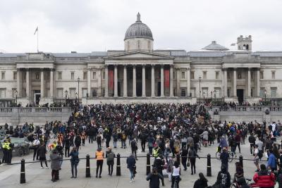 Vegan activists turn London's Trafalgar Square fountains red | Vegan activists turn London's Trafalgar Square fountains red