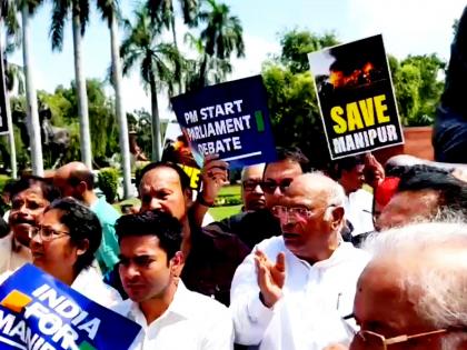 Oppn MPs stage protest near Gandhi statue in Parliament complex, demand PM's statement on Manipur | Oppn MPs stage protest near Gandhi statue in Parliament complex, demand PM's statement on Manipur Oppn MPs stage protest near Gandhi statue in Parliament complex, demand PM's statement on Manipur | Oppn MPs stage protest near Gandhi statue in Parliament complex, demand PM's statement on Manipur