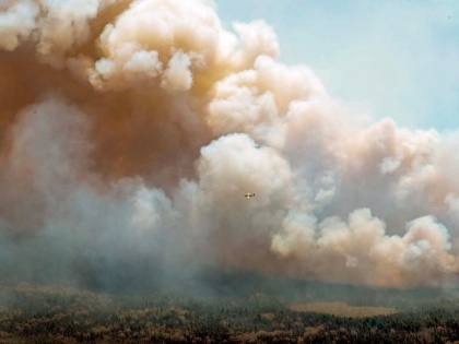 Canada wildfires: Millions advised to wear mask as smoke streams over US | Canada wildfires: Millions advised to wear mask as smoke streams over US