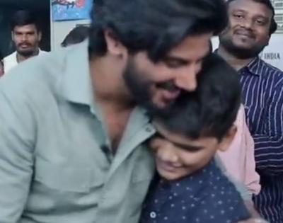 Dulquer plays Santa to less privileged kids, says they made his day | Dulquer plays Santa to less privileged kids, says they made his day