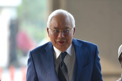 Verdict on ex-Malay PM's 1st case set for July | Verdict on ex-Malay PM's 1st case set for July