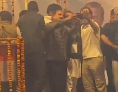 Viral video shows Rahul pushing down party worker's phone | Viral video shows Rahul pushing down party worker's phone
