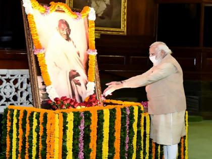 It's our collective endeavour to further popularise his noble ideals: PM Modi pays homage to Mahatma Gandhi on his death anniversary | It's our collective endeavour to further popularise his noble ideals: PM Modi pays homage to Mahatma Gandhi on his death anniversary It's our collective endeavour to further popularise his noble ideals: PM Modi pays homage to Mahatma Gandhi on his death anniversary | It's our collective endeavour to further popularise his noble ideals: PM Modi pays homage to Mahatma Gandhi on his death anniversary