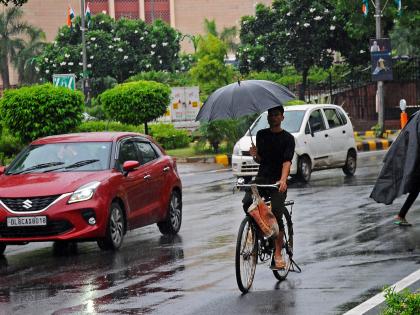 Rain brings relief from scorching heat in Delhi, min temperature dips | Rain brings relief from scorching heat in Delhi, min temperature dips Rain brings relief from scorching heat in Delhi, min temperature dips | Rain brings relief from scorching heat in Delhi, min temperature dips