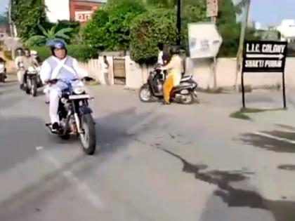 Haryana CM rides motorcycle to reach airport | Haryana CM rides motorcycle to reach airport