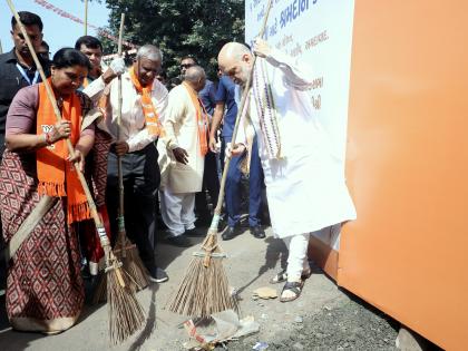 Amit Shah leads cleanliness drive in Ahmedabad ahead of Gandhi Jayanti | Amit Shah leads cleanliness drive in Ahmedabad ahead of Gandhi Jayanti Amit Shah leads cleanliness drive in Ahmedabad ahead of Gandhi Jayanti | Amit Shah leads cleanliness drive in Ahmedabad ahead of Gandhi Jayanti