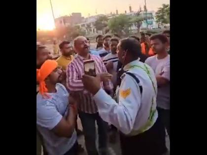 Ghaziabad: Vehicle with religious sticker fined, Hindu Raksha Dal chief booked for creating ruckus | Ghaziabad: Vehicle with religious sticker fined, Hindu Raksha Dal chief booked for creating ruckus Ghaziabad: Vehicle with religious sticker fined, Hindu Raksha Dal chief booked for creating ruckus | Ghaziabad: Vehicle with religious sticker fined, Hindu Raksha Dal chief booked for creating ruckus