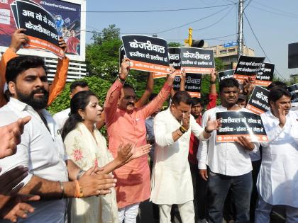 Delhi BJP stages protest against Kejriwal govt's 'corruption' | Delhi BJP stages protest against Kejriwal govt's 'corruption' Delhi BJP stages protest against Kejriwal govt's 'corruption' | Delhi BJP stages protest against Kejriwal govt's 'corruption'