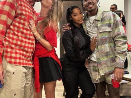 Taylor Swift kisses beau Travis Kelce on cheek as they hang out after game | Taylor Swift kisses beau Travis Kelce on cheek as they hang out after game Taylor Swift kisses beau Travis Kelce on cheek as they hang out after game | Taylor Swift kisses beau Travis Kelce on cheek as they hang out after game