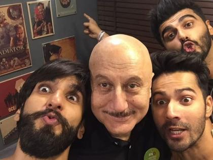 Anupam is reminded of ‘Padosan’ as he poses with Varun, Ranveer, Arjun | Anupam is reminded of ‘Padosan’ as he poses with Varun, Ranveer, Arjun Anupam is reminded of ‘Padosan’ as he poses with Varun, Ranveer, Arjun | Anupam is reminded of ‘Padosan’ as he poses with Varun, Ranveer, Arjun