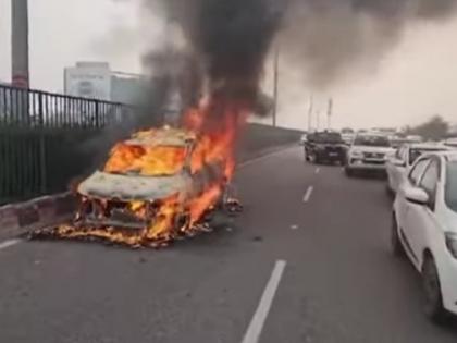 Gurugram: Moving car catches fire on Iffco Chowk flyover | Gurugram: Moving car catches fire on Iffco Chowk flyover Gurugram: Moving car catches fire on Iffco Chowk flyover | Gurugram: Moving car catches fire on Iffco Chowk flyover