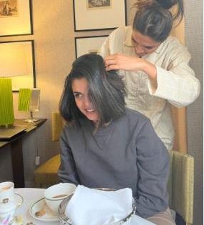 Deepika Padukone tries her hairstyling skills on friend | Deepika Padukone tries her hairstyling skills on friend