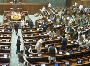 Two protesters carrying colour smoke flare detained outside Parliament | Two protesters carrying colour smoke flare detained outside Parliament Two protesters carrying colour smoke flare detained outside Parliament | Two protesters carrying colour smoke flare detained outside Parliament