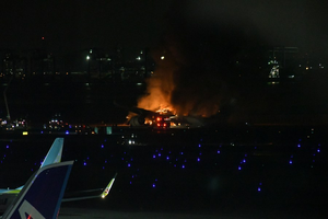Tokyo airport runway reopens after last week's plane collision | Tokyo airport runway reopens after last week's plane collision Tokyo airport runway reopens after last week's plane collision | Tokyo airport runway reopens after last week's plane collision
