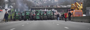 Police arrest 91 as protesting farmers force into Paris food market | Police arrest 91 as protesting farmers force into Paris food market