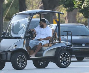 DJ Khaled pulled over in Miami while driving golf cart shoeless | DJ Khaled pulled over in Miami while driving golf cart shoeless