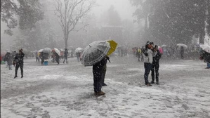 Rain, snow in J&K as MeT predicts inclement weather | Rain, snow in J&K as MeT predicts inclement weather