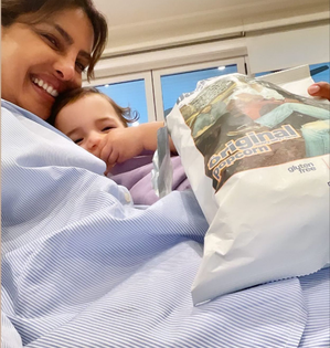 Priyanka Chopra, daughter Malti cozy up with popcorn treat | Priyanka Chopra, daughter Malti cozy up with popcorn treat Priyanka Chopra, daughter Malti cozy up with popcorn treat | Priyanka Chopra, daughter Malti cozy up with popcorn treat