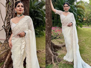 Raveena Tandon is a picture of elegance in white saree for wedding | Raveena Tandon is a picture of elegance in white saree for wedding
