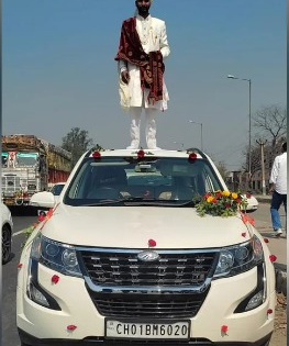 UP groom stands atop car, police seize vehicle | UP groom stands atop car, police seize vehicle