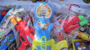 Holi 2024: Saffron Color Dominates Market with PM Modi and CM Yogi-themed Products in Lucknow | Holi 2024: Saffron Color Dominates Market with PM Modi and CM Yogi-themed Products in Lucknow