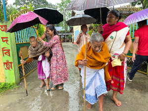 Long queues at many polling stations in Assam | Long queues at many polling stations in Assam