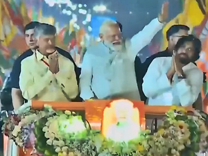 PM Modi holds roadshow in Vijayawada with Chandrababu Naidu, Pawan Kalyan | PM Modi holds roadshow in Vijayawada with Chandrababu Naidu, Pawan Kalyan