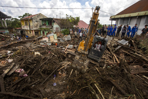 Death toll in Indonesia's floods, volcanic mudflows rises to 52 | Death toll in Indonesia's floods, volcanic mudflows rises to 52