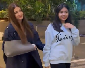 Aishwarya Rai Bachchan wears arm sling as she heads to Cannes with daughter Aaradhya | Aishwarya Rai Bachchan wears arm sling as she heads to Cannes with daughter Aaradhya