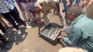 Maharashtra CM Eknath Shinde's luggage checked by poll officials in Nashik | Maharashtra CM Eknath Shinde's luggage checked by poll officials in Nashik