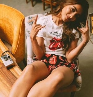 Cotton t-shirts, shorts, sneakers are Pooja Hegde's summer choices | Cotton t-shirts, shorts, sneakers are Pooja Hegde's summer choices