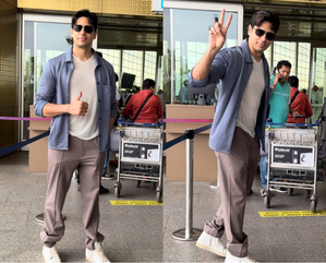 Sidharth Malhotra en route to Delhi to cast his vote, shows victory sign to paparazzi | Sidharth Malhotra en route to Delhi to cast his vote, shows victory sign to paparazzi